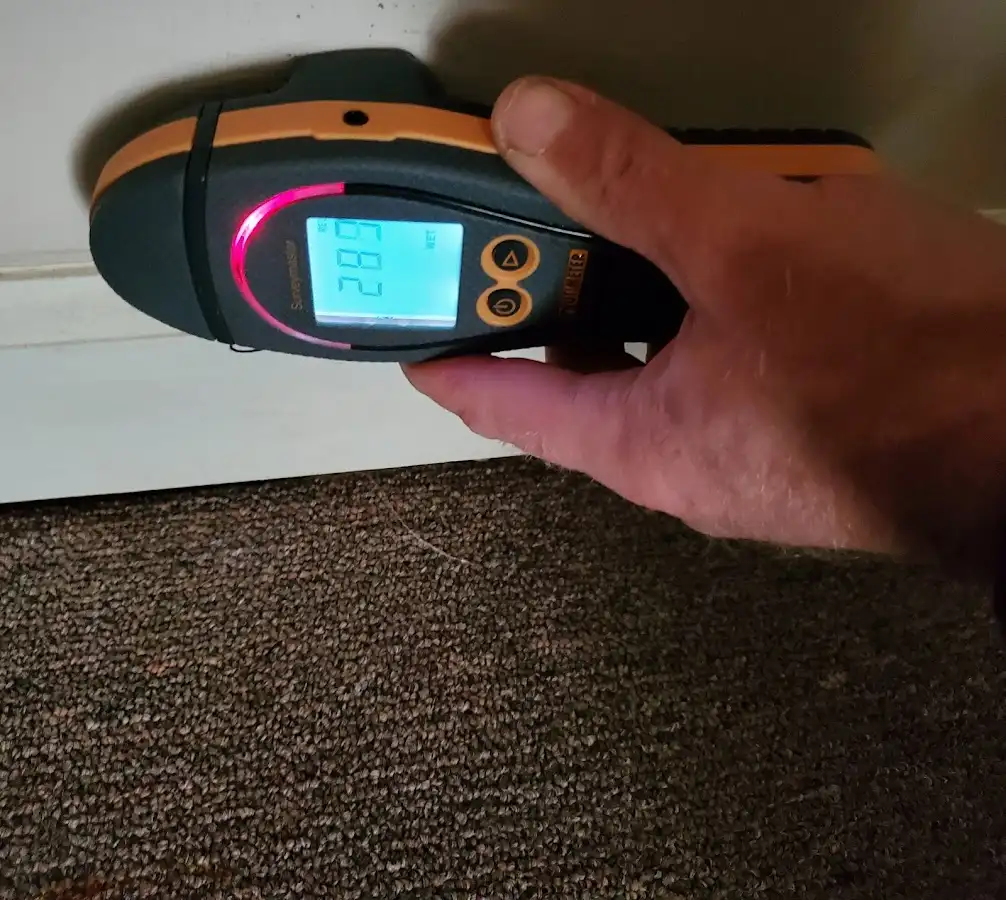 Moisture detection at baseboard during Storm Damage Restoration in Clarksdale